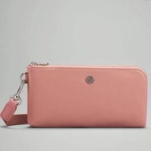NWT Lululemon Curved Wristlet in Pink Pastel